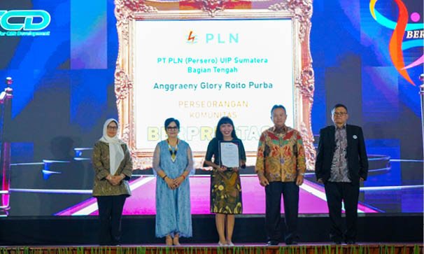 A group of people stand on a stage in front of a large picture. AI generated content