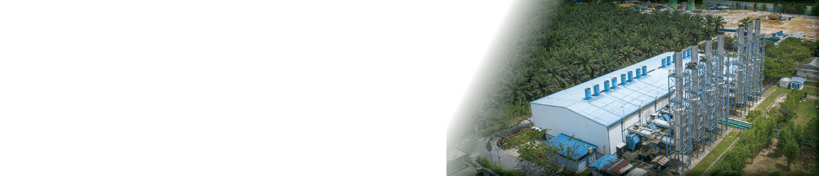 A large industrial building with a white roof and a green roof. AI generated content