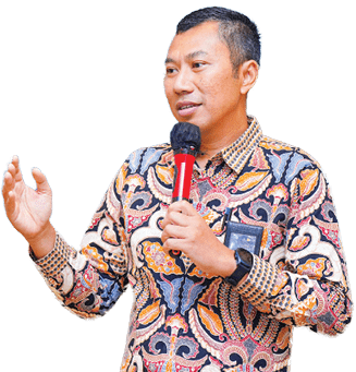 A man in a colorful shirt is speaking into a microphone. AI generated content