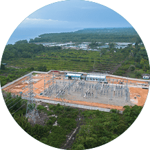 A large construction site is surrounded by trees and water. AI generated content